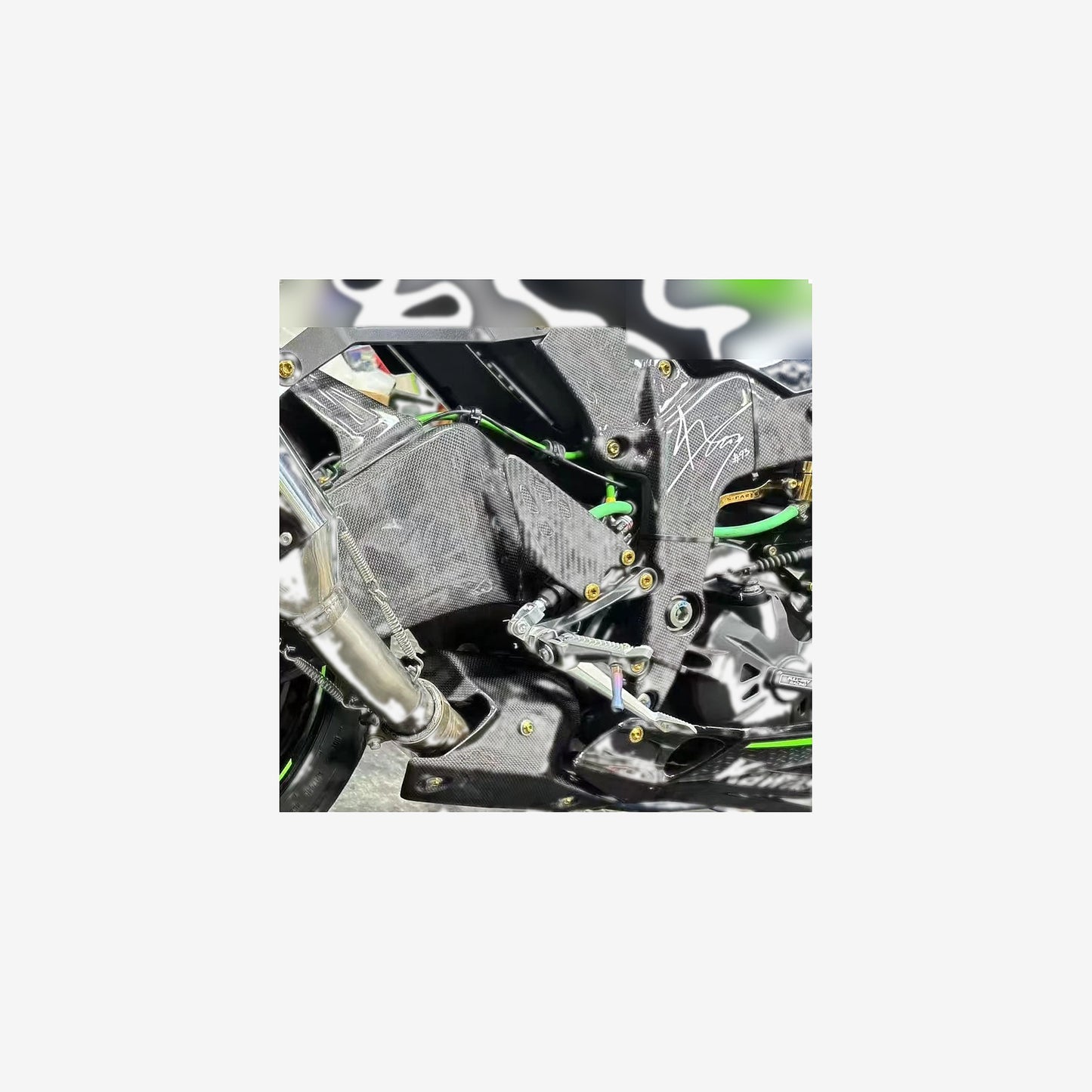 Carbon Fiber Heel Guards – Kawasaki ZX-6R / 636 (2019–2025)