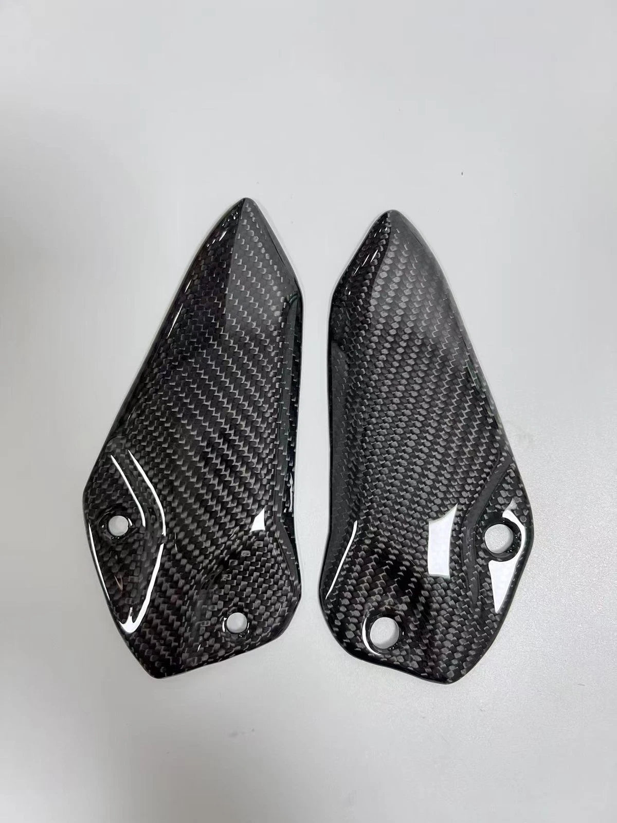 Carbon Fiber Heel Guards – Kawasaki Ninja ZX-4RR (2023–2026)