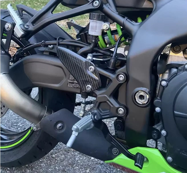 Carbon Fiber Heel Guards – Kawasaki Ninja ZX-4RR (2023–2026)